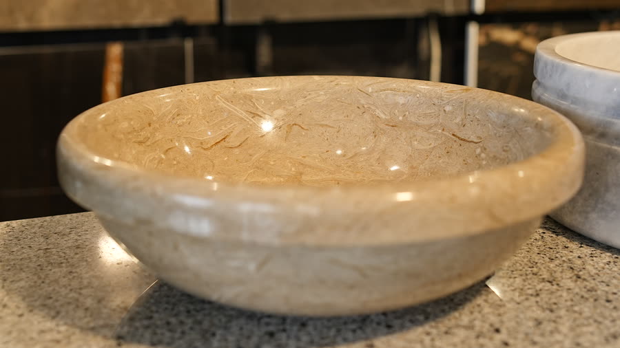 Cream marble bowl basin. Wide cream marble bowl basin.