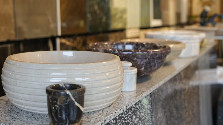 The basin counter. The showroom basin counter, with a ribbed basin in front.